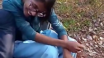 Swathi, A Teacher From India, Engages In Sexual Activities With Her Students In The Woods For Financial Gain.