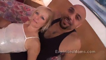 A Non-Professional Engages In Sexual Activity With A Large Black Penis In A Steamy Video Featuring A Blonde Middle-Aged Woman